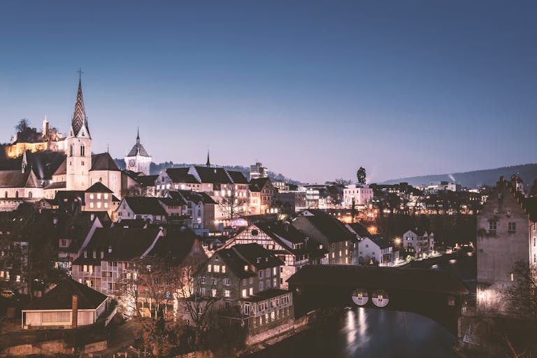 Beautiful twilight cityscape of Baden, Switzerland with historic architecture and skyline.