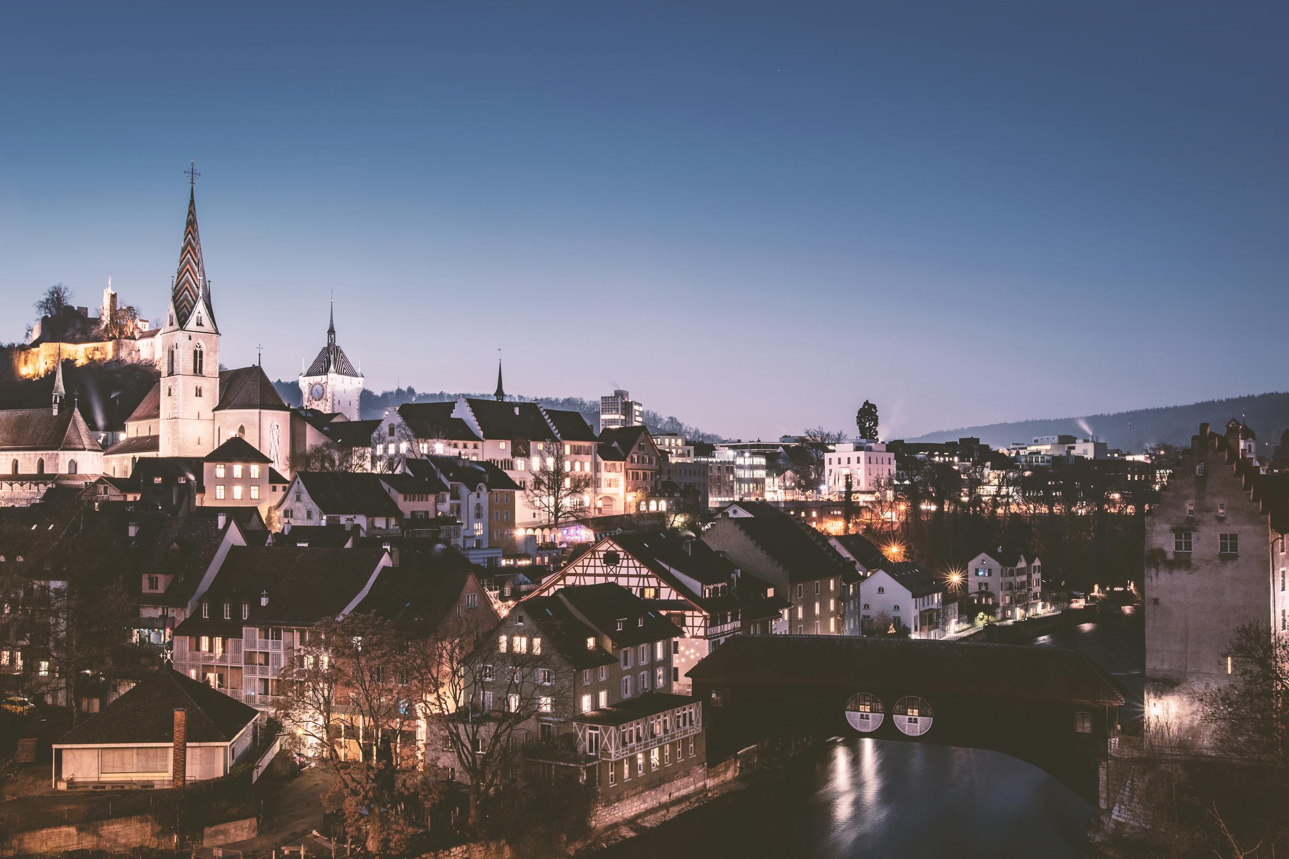 Beautiful twilight cityscape of Baden, Switzerland with historic architecture and skyline.