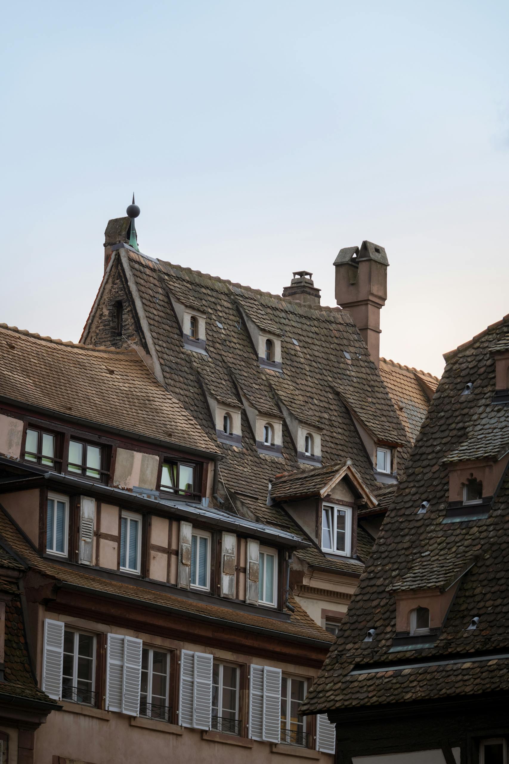Explore the charming medieval architecture of Strasbourg with unique rooftops and historic buildings.